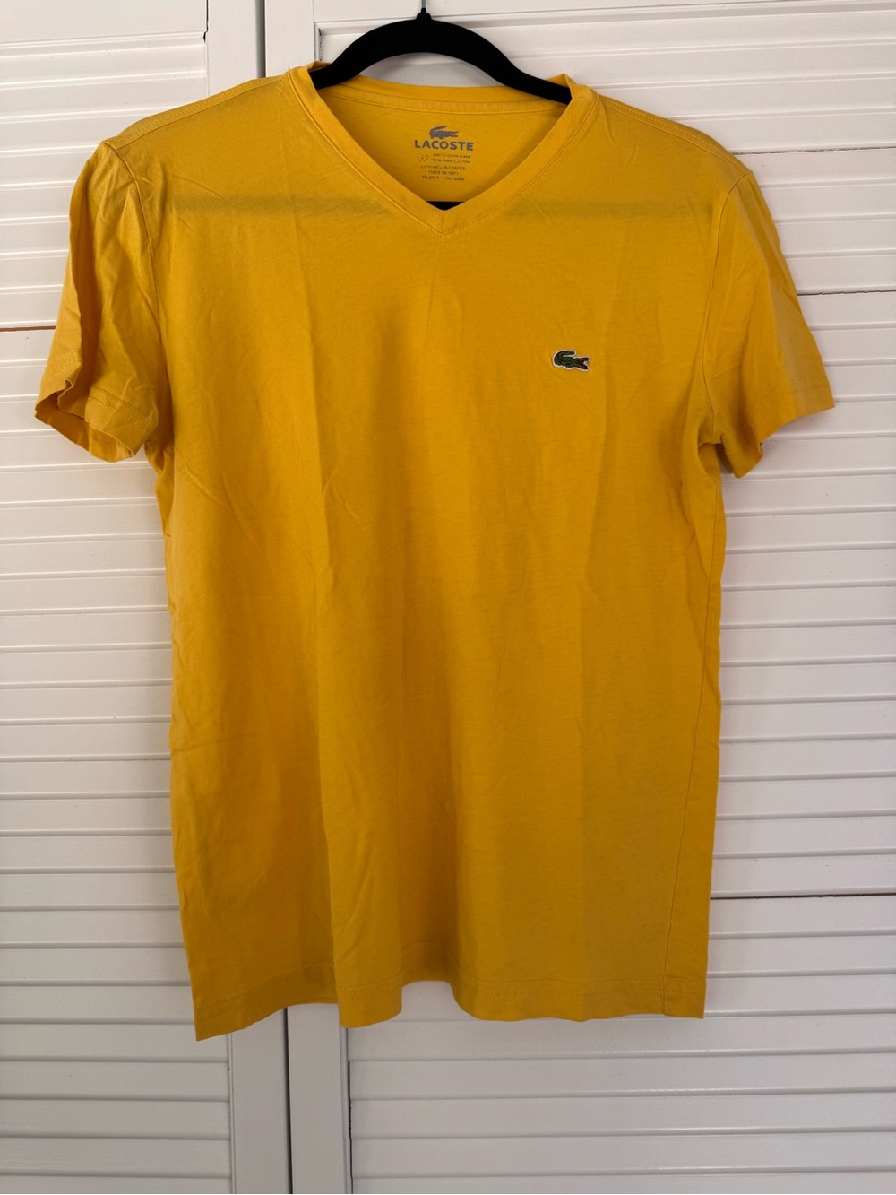 Vintage Lacoste Women Y2K V-Neck T-Shirt in Mustard Yellow